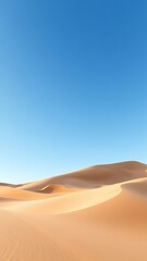 Golden sand dunes stretch endlessly under a vast, cloudless blue sky, capturing the serene and timeless beauty of a remote desert wilderness