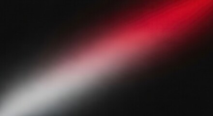 Obraz premium Abstract diagonal red and white light beam effect on black background