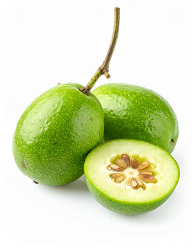 Fresh umbu fruits isolated on white background, whole and halved, juicy pulp, tropical fruit, healthy