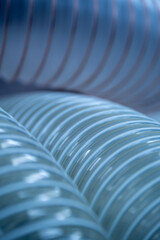 close up of blue plastic pipes