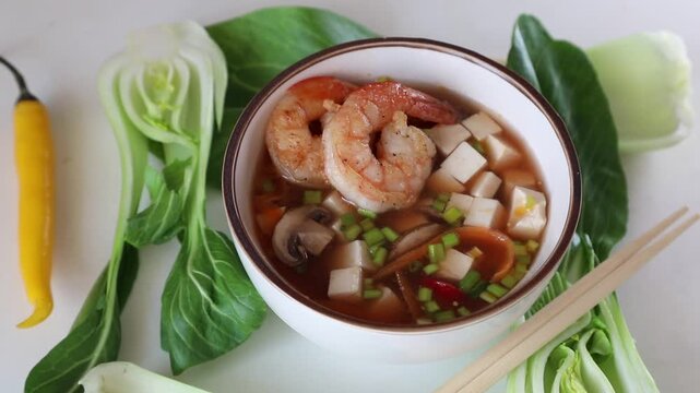Japanese miso soup, rotating, top view