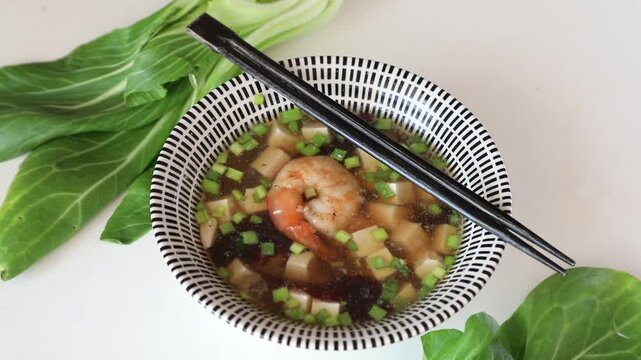 Japanese miso soup, rotating, top view