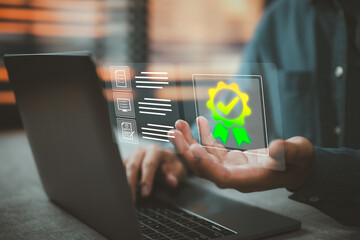 Quality assurance concept with digital certificate and checkmark hologram over laptop