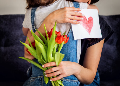 Mother and daughter embrace with love on mother's day
