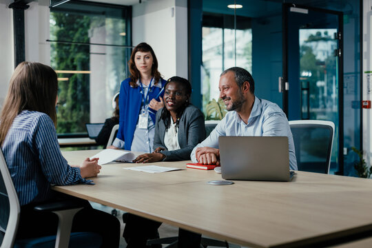 Business people having job interview or meeting in modern office