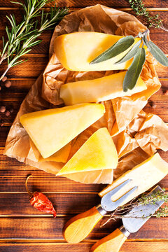 cheese with spice and fresh herb on a table