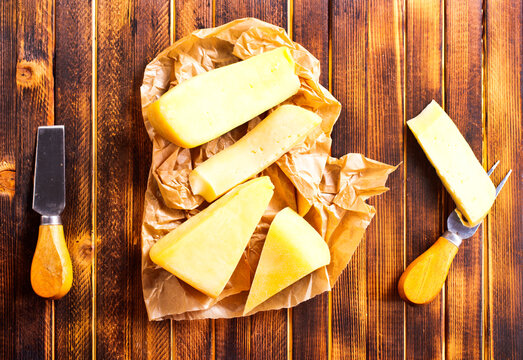 cheese with spice and fresh herb on a table