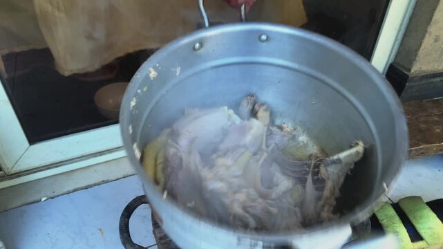 The Chicken are boiled separately to be added to the mix of doro wat Chicken Stew Ethiopian dish.
