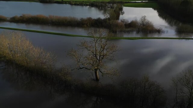 Serene flooded landscape by Malton Bypass, North Yorkshire A64