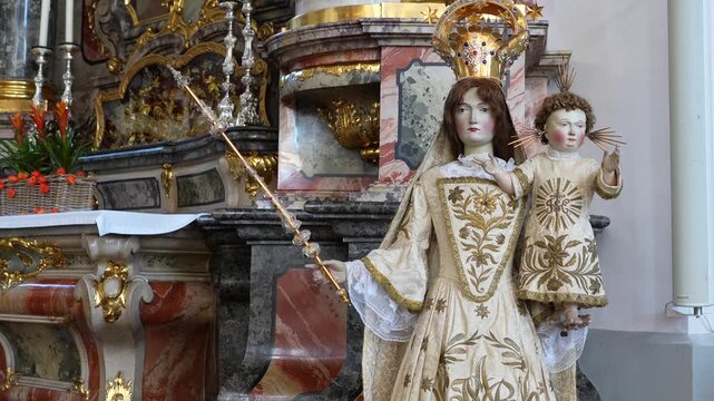 Footage showing the intricately designed pulpit and decorative interior walls of the famous church in Canton Schwyz.