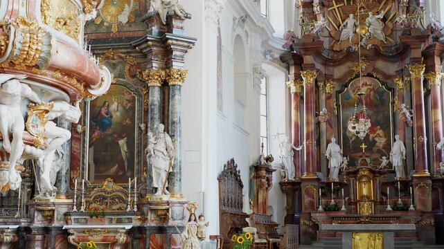 Medium shot capturing the richness of the gold and marble work on the monastery&rsquo;s altar.