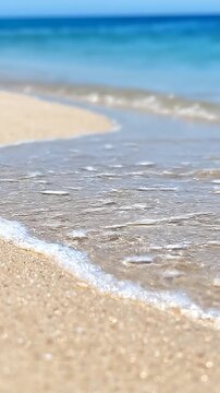 Serene Beach Waves on Sandy Shore.