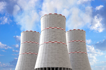 Cooling towers of nuclear power station against the blue sky