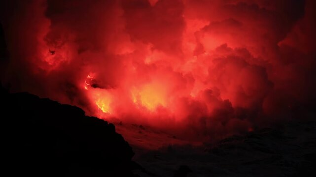 Dramatic volcanic lava flow entering the ocean on the Big Island of Hawaii. Glowing molten lava meets seawater, creating intense steam clouds and fiery red light against a dark coastal landscape.