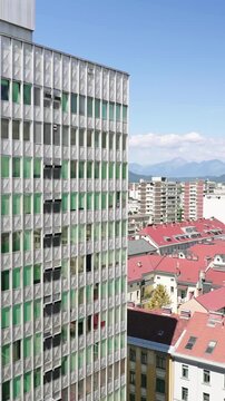 Ljubljana city skyscraper parallax motion with single building in focus