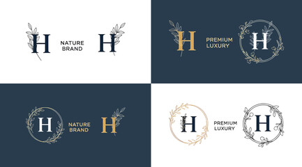 Collection of elegant letter h logos with floral wreaths and monograms on white and dark blue backgrounds © S.Siam