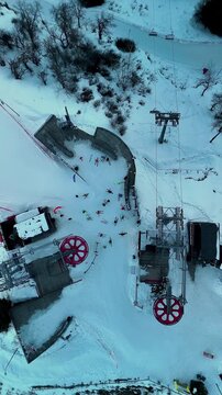 Aerial view skier racing at ski resort with snow