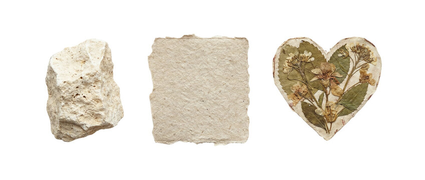 Minimal natural collage with textured stone, handmade deckled paper sheet and pressed flower heart ornament, isolated on transparent background
