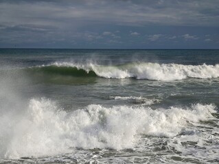 Naklejka premium Chaotic storm sea, Fierce ocean turmoil captured through crashing waves and turbulent weather