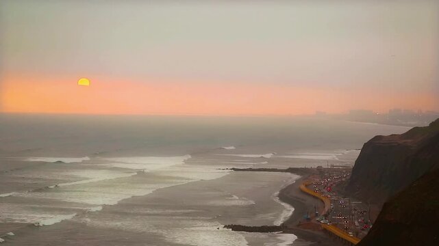 Footage of Miraflores at Sunset on the Pacific coast with People Enjoy Paragliding and Surfboarding, Lima, Peru, South America