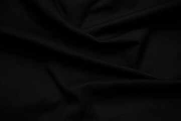 deep black fabric background copy space.