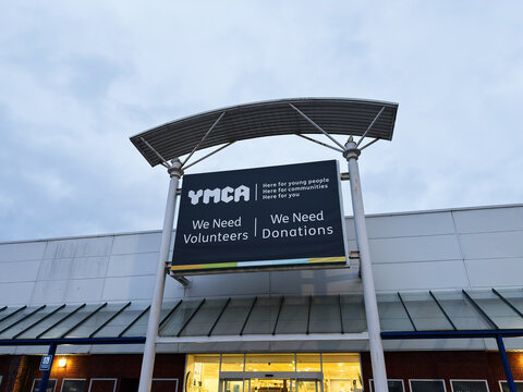 YMCA Signboard Appeals for Volunteers and Donations in Manchester UK