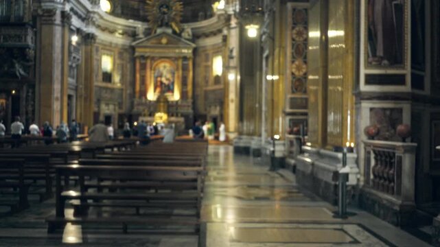 Blurred catholic interior with shallow bokeh and defocused pews church; background backplate copyspace calm.