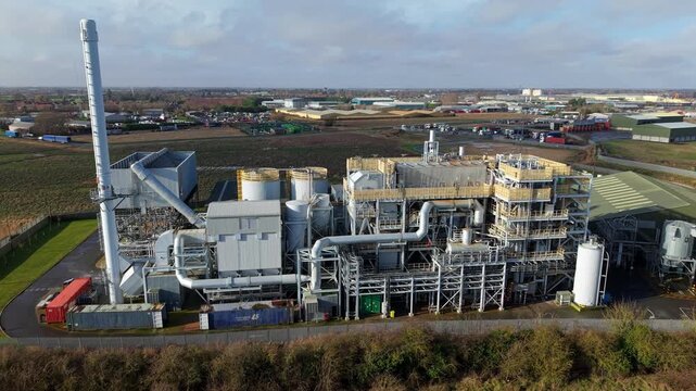Aerial view of the Biomass Nr. 3 power station, a sprawling industrial complex with its tall chimney reaching skyward, Biomass Nr. 3, Boston, United Kingdom.