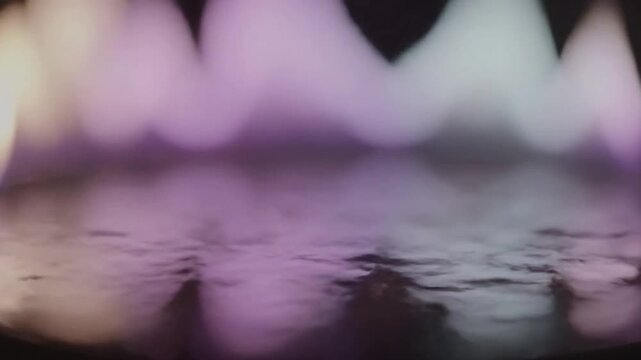 Abstract Pastel Light Twinkle Focus on the ethereal, shifting patterns of pastel light against a dark, undefined background, emphasizing the slow, twinkling effect without any discernible source.