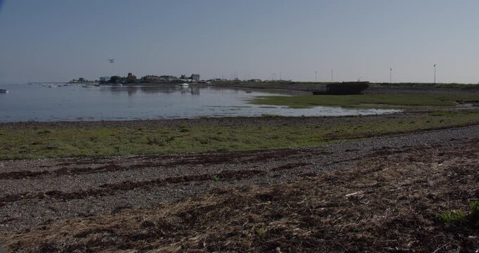 Extra wide shot of Roa Island road with roa island in background