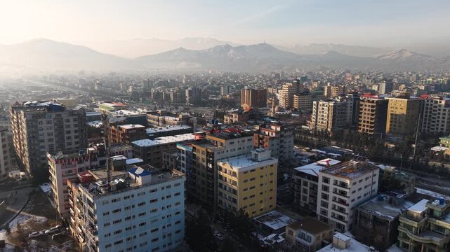 Aerial of Khair Khana Kabul the landscape of apartments and sown mountains view.