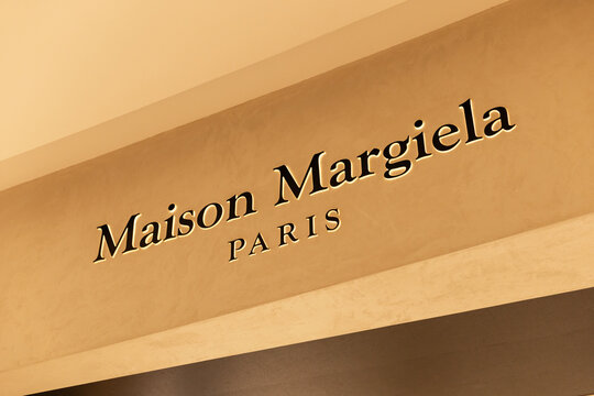 Singapore - January 27, 2026: Maison Margiela brand name is shown on a wall in a fashion store in Singapore. The store is located in a busy shopping area visited by many shoppers