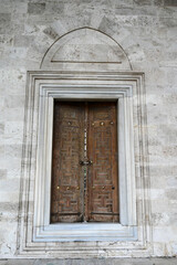 Closeup Old wooden door of Blue Mosque in Istanbul. Entrance in Sultan Ahmet Camii.
