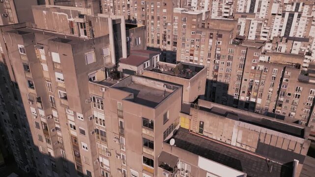 Aerial drone footage of the iconic stepped residential buildings (Blok 45/63) in New Belgrade, showcasing unique brutalist architecture from the socialist modernism era. Belgrade,Serbia 02.02.2026

