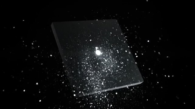A dark scene shows a square object emitting bright particles with a light source illuminating a central cluster of white sparks and tiny white specks