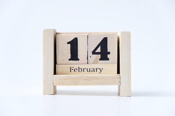 Wooden block calendar for February 14 isolated on white background