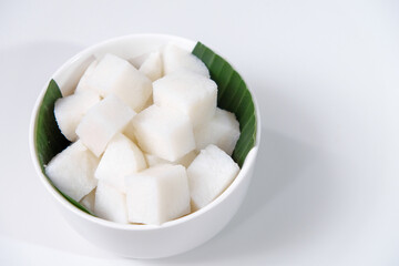 Sliced ketupat, Indonesian traditional rice cake, commonly served during Eid al-Fitr or lebaran. Isolated on white background