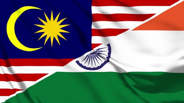 Malaysia and India flags waving together creating dynamic visual display of international relations and cooperation