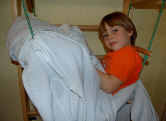 little boy playing with a toy