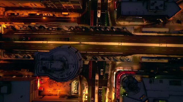 Berlin illuminating shopping street snowed at night. Lovely aerial view drone