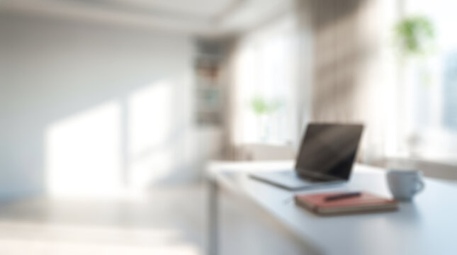 Minimalist summer home office desk with laptop and coffee cup in bright sunlight background