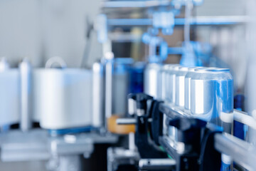 Automated beer canning process in modern brewery factory