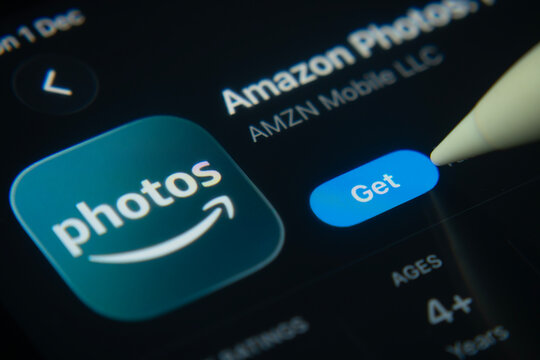 Dhaka, Bangladesh- 01 Dec 2025: A close-up of the Amazon photos app icon in the App Store on an iPad screen.