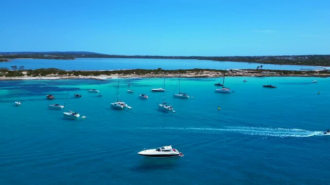 turquoise water coastline with salt flats and boats. Great aerial view drone