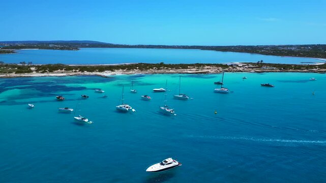 turquoise water coastline with salt flats and boats. Best aerial view drone