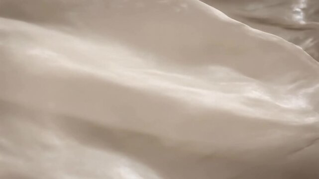 Iridescent Edge Refraction Highlighting the subtle light diffraction and pearlescent shimmer along the fabric's soft edges as it flows, creating an ethereal glow.