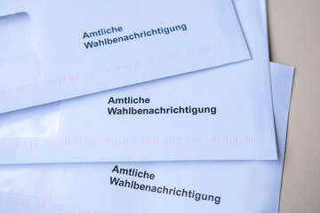 Close-up white envelope with German text Amtliche Wahlbenachrichtigung, official voter notification...