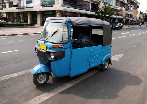 Blue Indonesia bajaj auto rickshaw parked on city street side view traditional three wheeler transportation in Jakarta urban public transit vehicle for passenger commuting and tourism travel