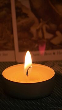 Burning Candle Flame in the Dark &ndash; Warm Light and Calm Atmosphere