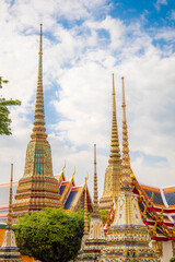 Naklejka premium Bangkok, Thailand - December 9, 2025 : Picture of pagodas in Wat Pho in Bangkok, Thailand, one of Thailand's oldest temples.